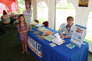 Trustee Yvonne Conner manning the BCET booth at Bookfest